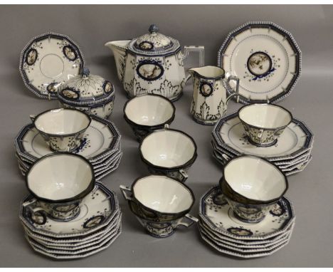 A VERY GOOD NYMPHENBURG "KINGS PATTERN" TEA SERVICE, white ground with moulded leaf work decoration, blue and grey painted bo