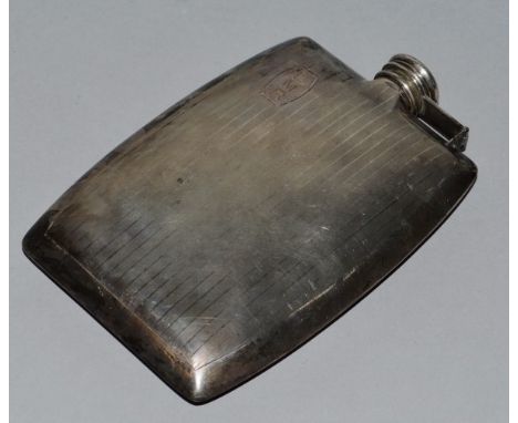 A STERLING SILVER ENGINE TURNED WHISKY FLASK, weight 5ozs and two dishes.