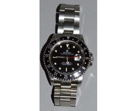 A GENTLEMAN'S STAINLESS STEEL ROLEX OYSTER PERPETUAL DATE GMT-MASTER WRISTWATCH, CIRCA 1991, Ref. 16700 automatic chronometer