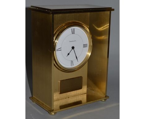 A LARGE TIFFANY & CO BRASS MANTLE CLOCK, 9.25ins high, No. 210780.