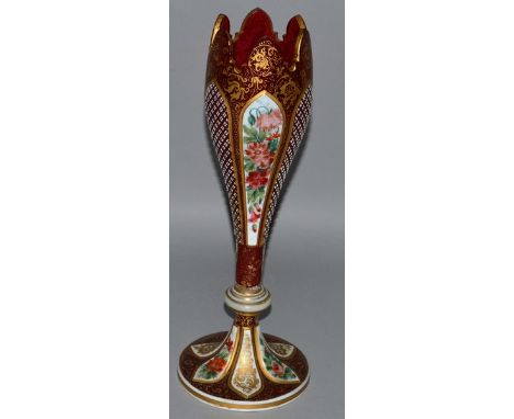 A GOOD 19TH CENTURY BOHEMIAN RUBY GLASS TALL VASE decorated in gilt with six reverse panels, white overlay and panels of flow