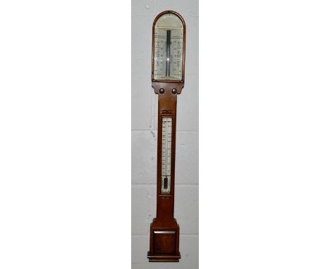 A MAHOGANY STICK BAROMETER, EARLY 20TH CENTURY, with engraved ivory dial, above a similar thermometer. 3ft 4ins high.