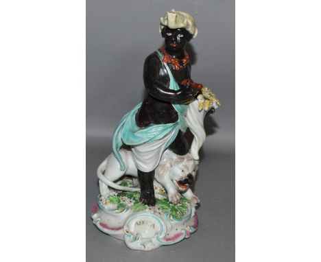 AN 18TH CENTURY DERBY FIGURE OF AFRICA standing holding a lobster and wear an elephant helmet, Africa in gold to base, patch 