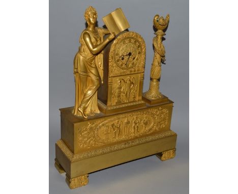 A GOOD FRENCH EMPIRE GILT ORMOLU MANTLE CLOCK with eight day movement, the case with a female classical figure and classical 