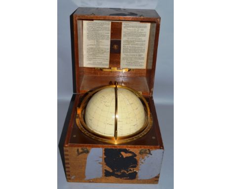 A STAR GLOBE EPOCH 1975 by KELVIN &amp; HUGHES LTD, printed by George Philip &amp; Son Ltd, 6.5ins diameter, in a folding mah