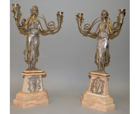 A GOOD PAIR OF MARBLE AND PLATE FIGURE TWO LIGHT CANDLESTICKS formed as a pair of classical female figures holding scrolling 