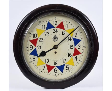 AN R.A.F. SECTOR WALL CLOCK the circular face with Arabic numerals, within a stained wooden surround, fitted with a single fu