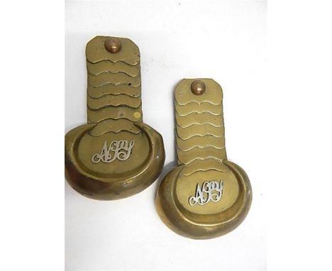 A PAIR OF NORTH SOMERSET YEOMANRY BRASS SHOULDER SCALES  early 19th century, of typical 'horseshoe' pattern, each bearing whi
