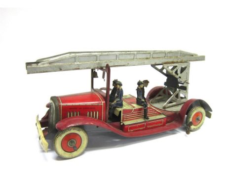 A METTOY TINPLATE FIRE ENGINE circa 1940s, red, with a raisable extending ladder, fitted with a clockwork mechanism, complete