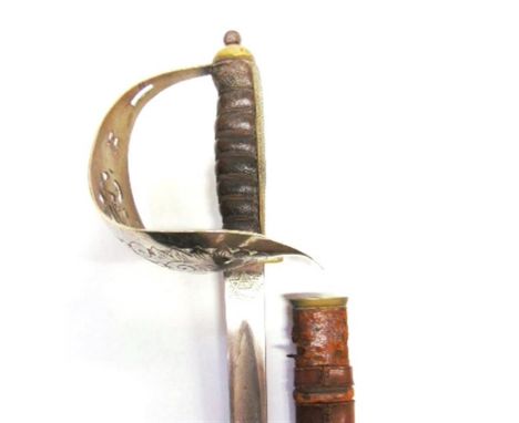 A BRITISH 1897 PATTERN INFANTRY OFFICER'S SWORD the 82cm engraved straight blade unmarked at the ricasso, the back edge unnum