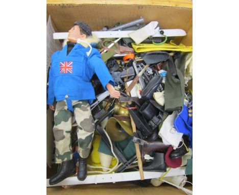 AN ACTION MAN COLLECTION comprising two figures (one lacking hands), and a quantity of military uniforms, other clothing, wea