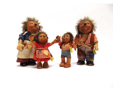 A STEIFF HEDGEHOG FAMILY comprising Mecki (father), Micki (mother), Macki (son) and Mucki (daughter), each with a rubber comp