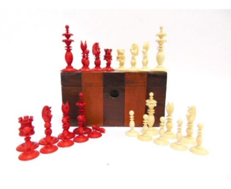 A WILLIAM LUND PART CHESS SET, stained red and natural ivory, the kings 8.5cm high, the base of the red king labelled 'Willm 