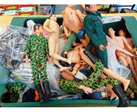 AN ACTION MAN COLLECTION comprising seven figures (some damaged); together with further body parts, similar action figures, a