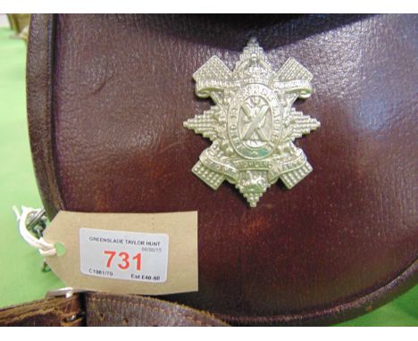 HIGHLAND LIGHT INFANTRY - A BRITISH ARMY ISSUE BROWN LEATHER SPORRAN  regulation pattern, inscribed with WD arrow device and 