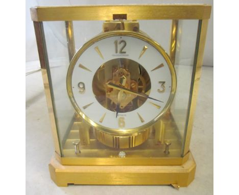 A Jaeger LeCoultre Atmos clock (locked for transport)