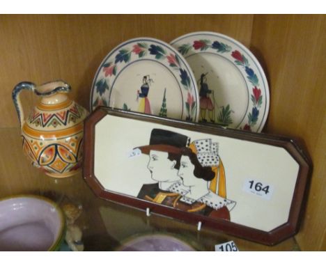 A Quimper Pottery jug, two plates and large Deco sandwich tray (slightly a/f)
