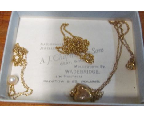 A 9ct gold brooch set red stone, 9ct heart pendant on chain and pearl pendant on chain