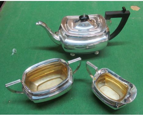 A silver teapot 19.7oz, sucrier 8.4oz and cream jug 5oz