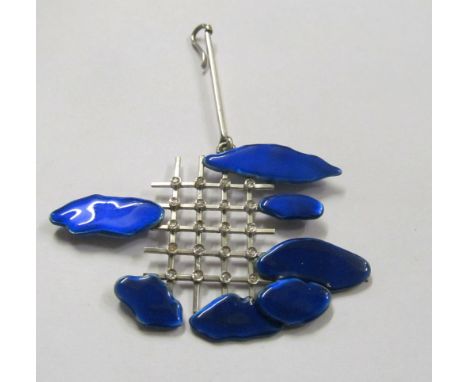A blue cloud enamel pendant on grid skeleton