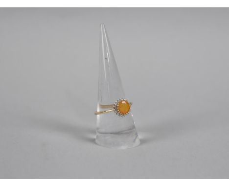 An Opal and White Stone 9ct Gold Mounted Ring, 2.6gms, Size S 