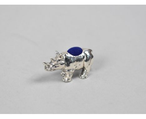 A Miniature Sterling Silver Pin Cushion Modelled as a Rhinoceros, 5x1.5cm high 