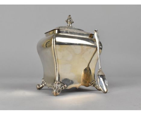 A 19th Century Silver Plated  Sarcophagus Shaped Tea Caddy with Scrolled Feet together with a Silver Spoon, 10cms Wide and 13