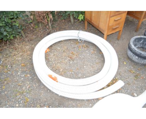 A short roll of drainage pipe 