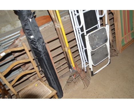 A quantity of long handled tools