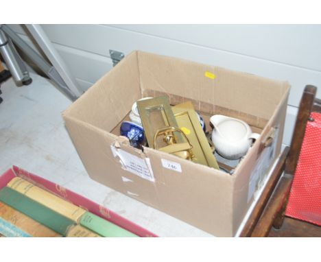 A box containing brass door knocker, two brass letter boxes, magnifying glass etc.