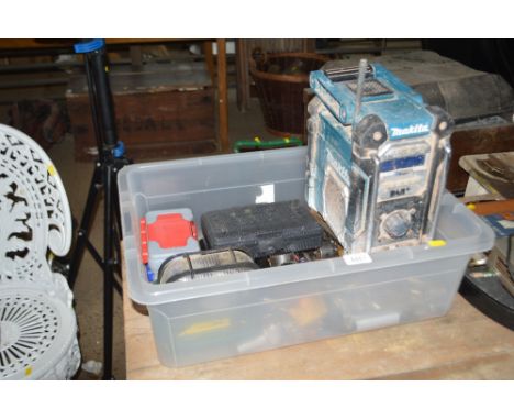A box of tools including a Makita battery operated DAB radio; socket sets etc. 