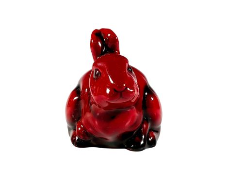 Style one, rare version. Red rich glaze of a seated rabbit. Model no. 1165A. 1165A marked to bottom. Royal Doulton backstamp.