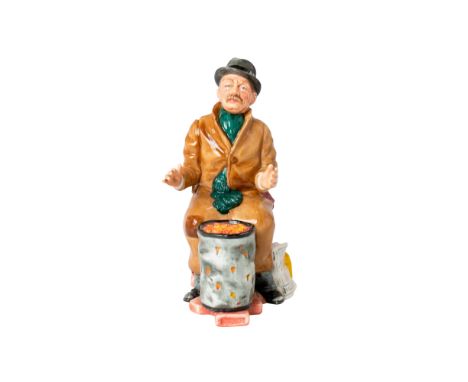 Model No. 2323. Fine China, glossy finish. Seated man warming up by a fire barrel. Numbered 2 of 3.Initially designed in 1972
