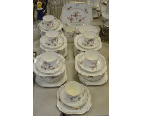 A Gladstone china tea service, printed with floral sprigs