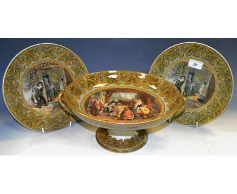 A Prattware comport, The Last In by W Mullready; a pair of Prattware plates, The Truant, T. Webster (3)