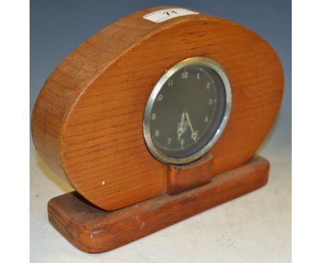 An unusual early/mid 20th century oak mantel clock, 