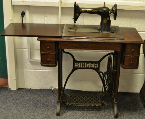 Singer treadle machine with original tools