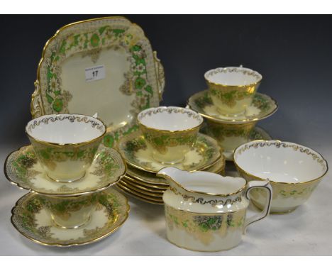 A Royal Crown Derby part tea service, registration number 758225 printed with a basket weave border and a floral band, gilt e