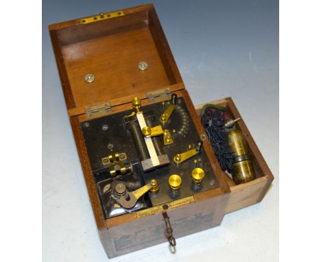 Scientific Instruments - an early 20th century mahogany cased electro therapy device, drop swing handle, with key 