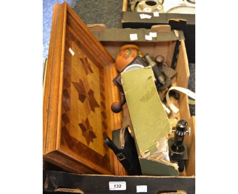 A coffee grinder; a desk blotter; microscope parquetry tray; etc