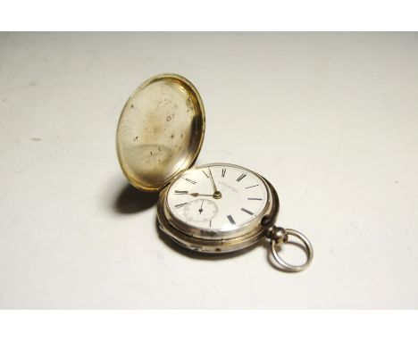 A Victorian silver full hunter pocket watch, Thomas Howard, Liverpool, white enamel dial, Roman numerals, silver case Chester