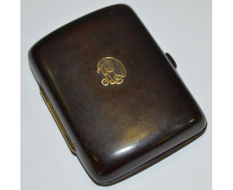 An early 20th century gold coloured metal mounted curved rounded rectangular pocket cigarette case, c.1920