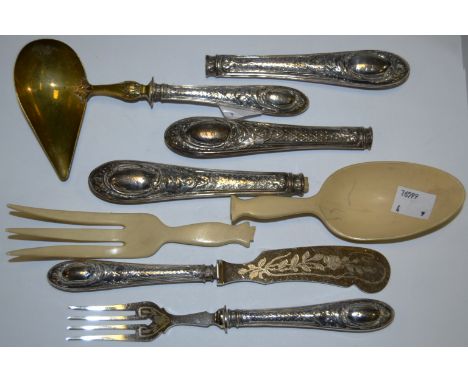 A French sauce ladle, the haft cast with leafy scrolls and trellis, gilt ladle;  a similar butter knife and preserve fork;  o