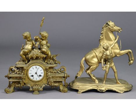 A 19th century gilt speltre figural mantel clock with white enamel dial &amp; 8-day movement, 32cm wide x 38cm high; &amp; a 