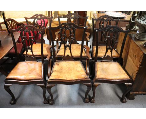 A set of six mahogany Chippendale-style dining chairs (including a pair of elbow chairs) with carved &amp; pierced splat back