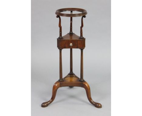 A mid-18th century mahogany basin stand on slender turned supports, frieze drawer to the triform upper tier, &amp; on three c