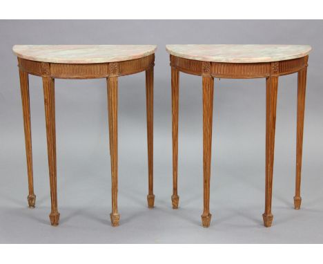 A pair of late 19th/early 20th century continental pine demi-lune console tables with pink &amp; grey mottled marble tops, on