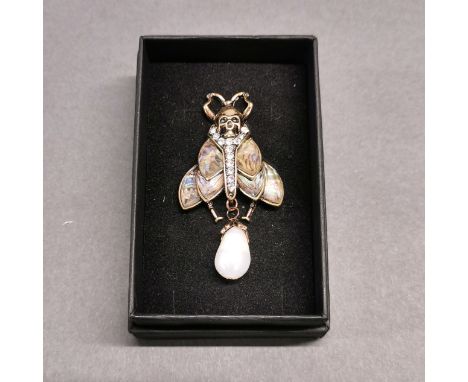 Alexander McQueen style costume jewellery earrings. In the form of a deaths head hawk moth with simulated abalone shell and s