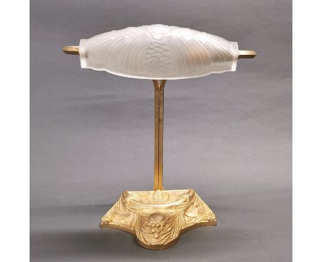 A frosted glass and gilt metal French desk lamp with relief decoration, H. 34cm.