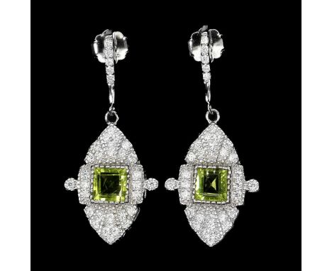 A pair of Art Deco style 925 silver drop earrings set with step cut peridots and white stones, L. 3.2cm.